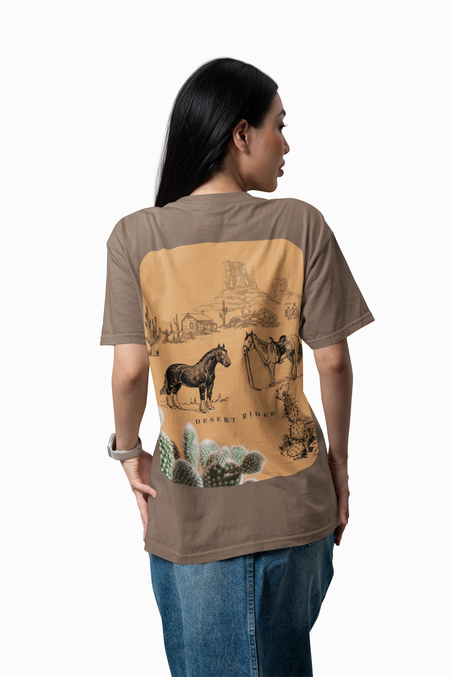 Person wearing a brown t-shirt with a desert-themed graphic on the back