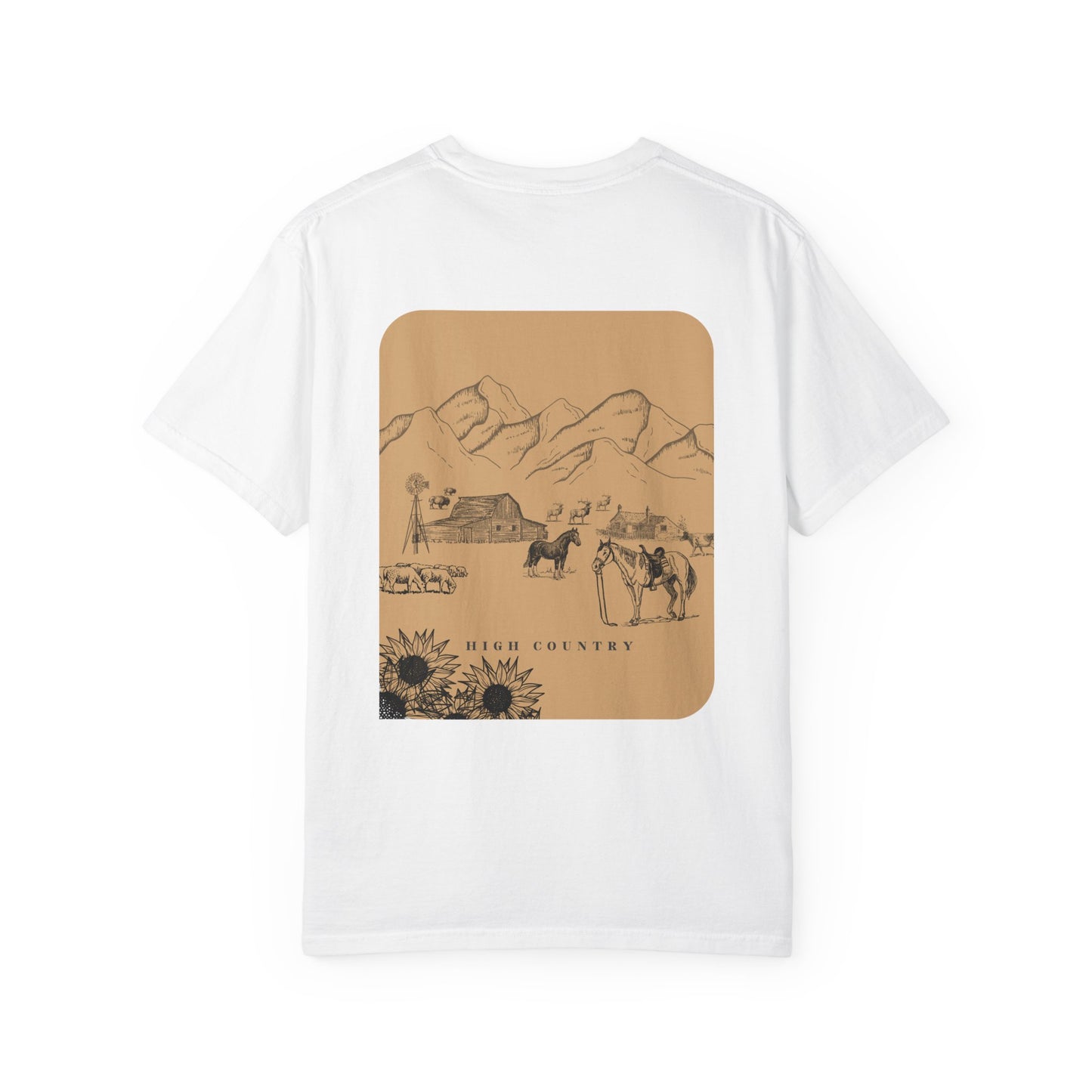 White t-shirt with a graphic of a mountain landscape and horse on a brown background
