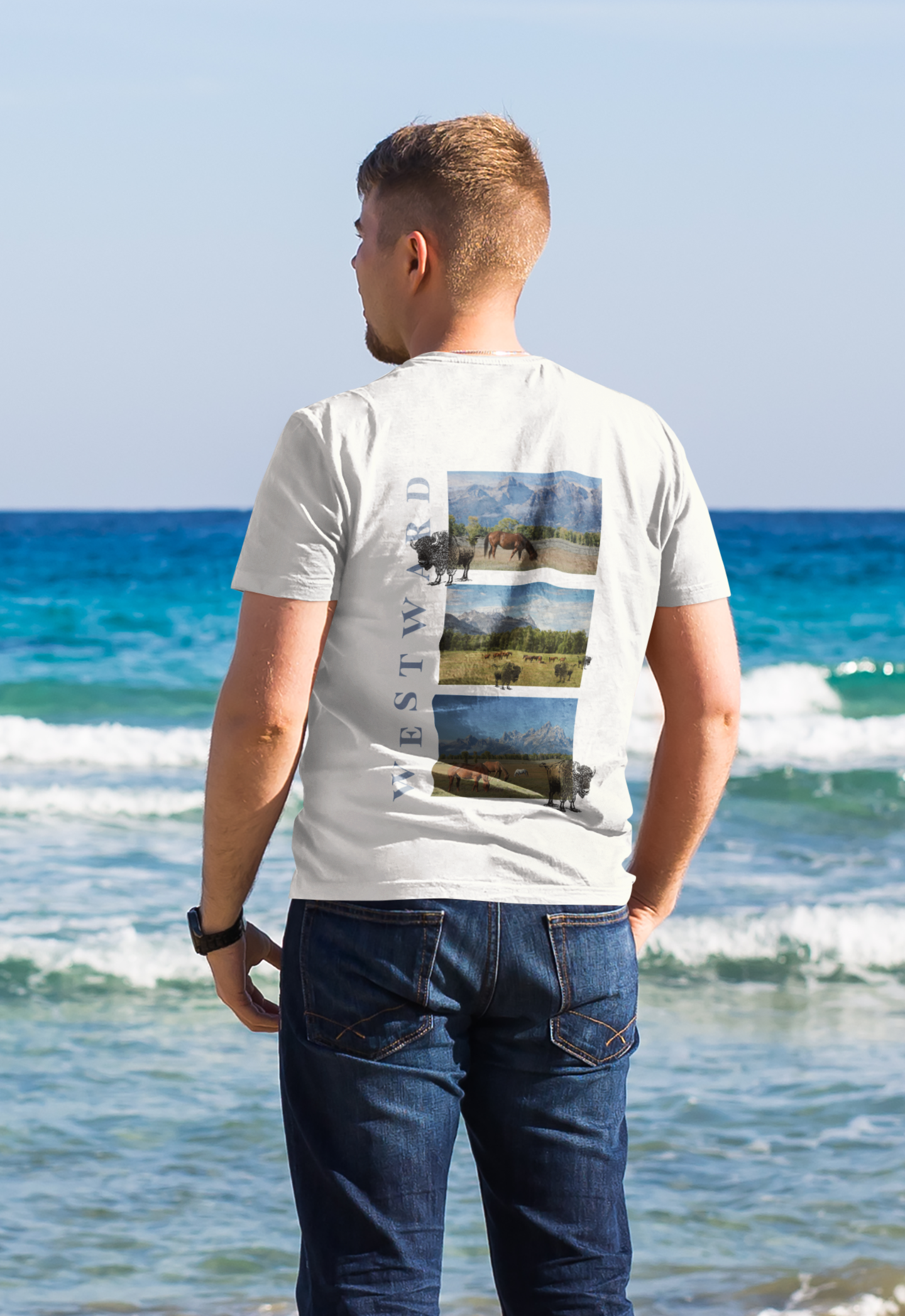 Man wearing a t-shirt with a scenic print on the beach
