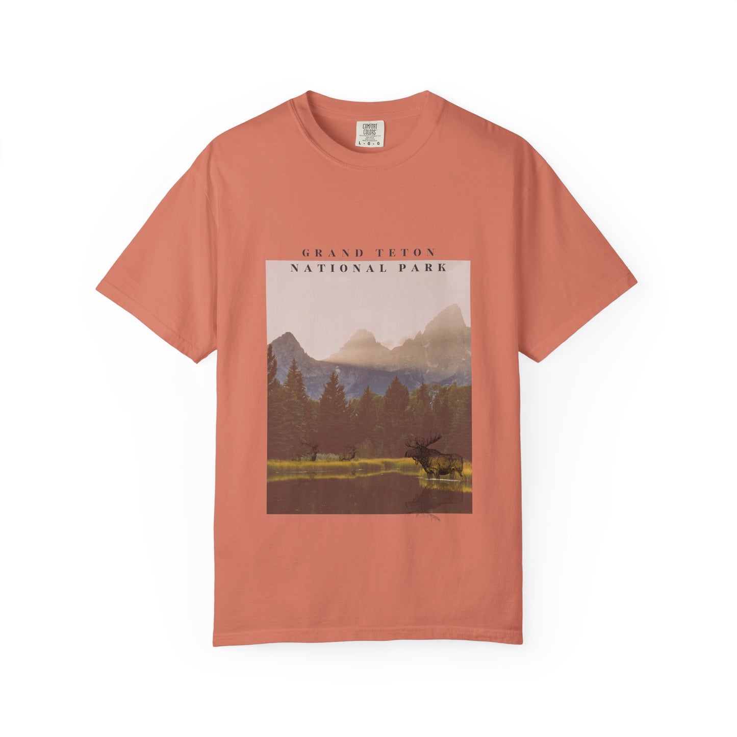 Coral t-shirt with Grand Teton National Park graphic on a white background
