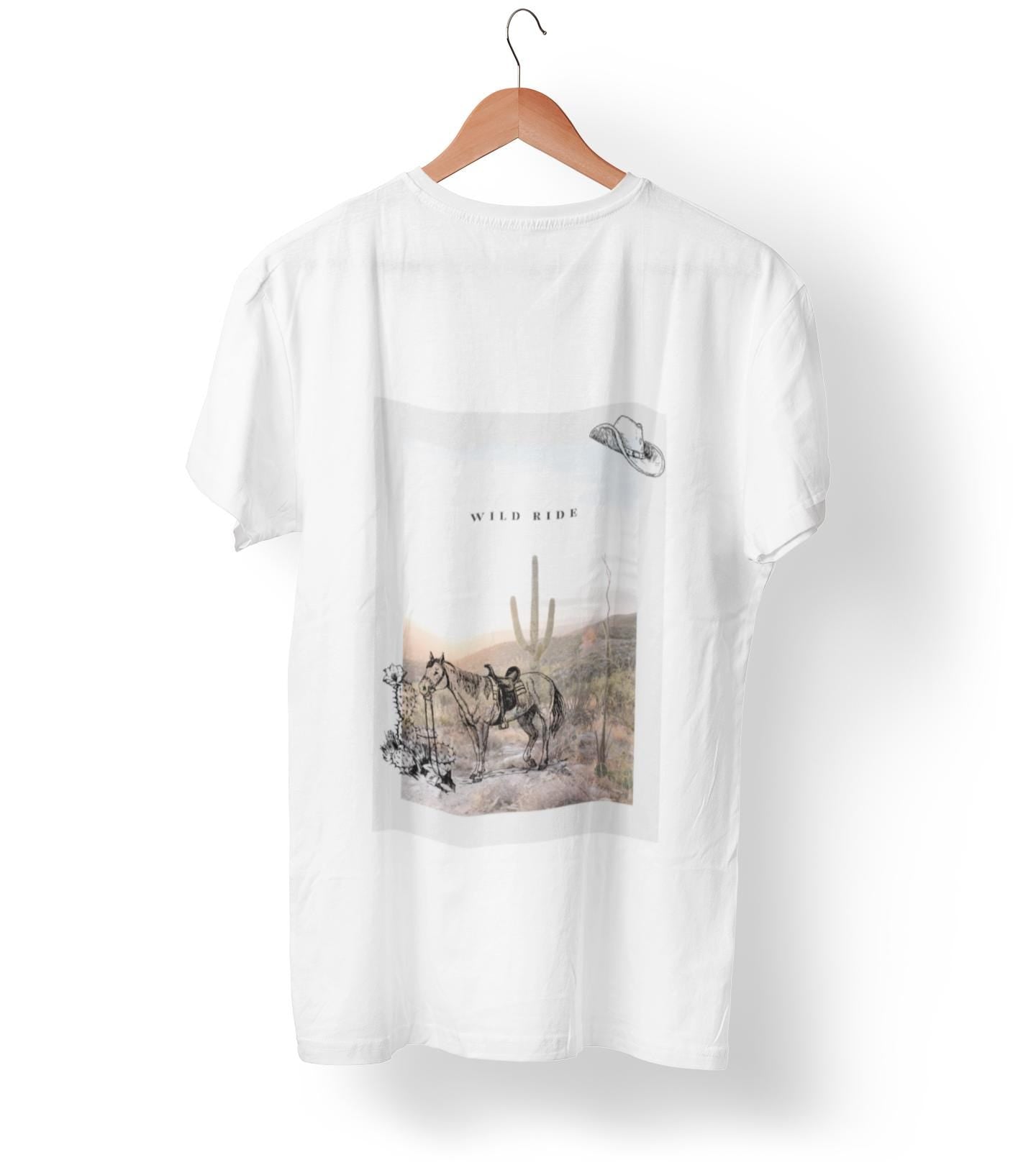 White t-shirt with graphic design on a hanger against a white background
